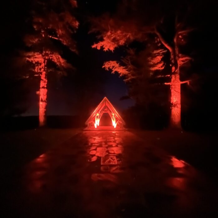 Uplights illuminate a striking Chapel Gazebo in Sussex